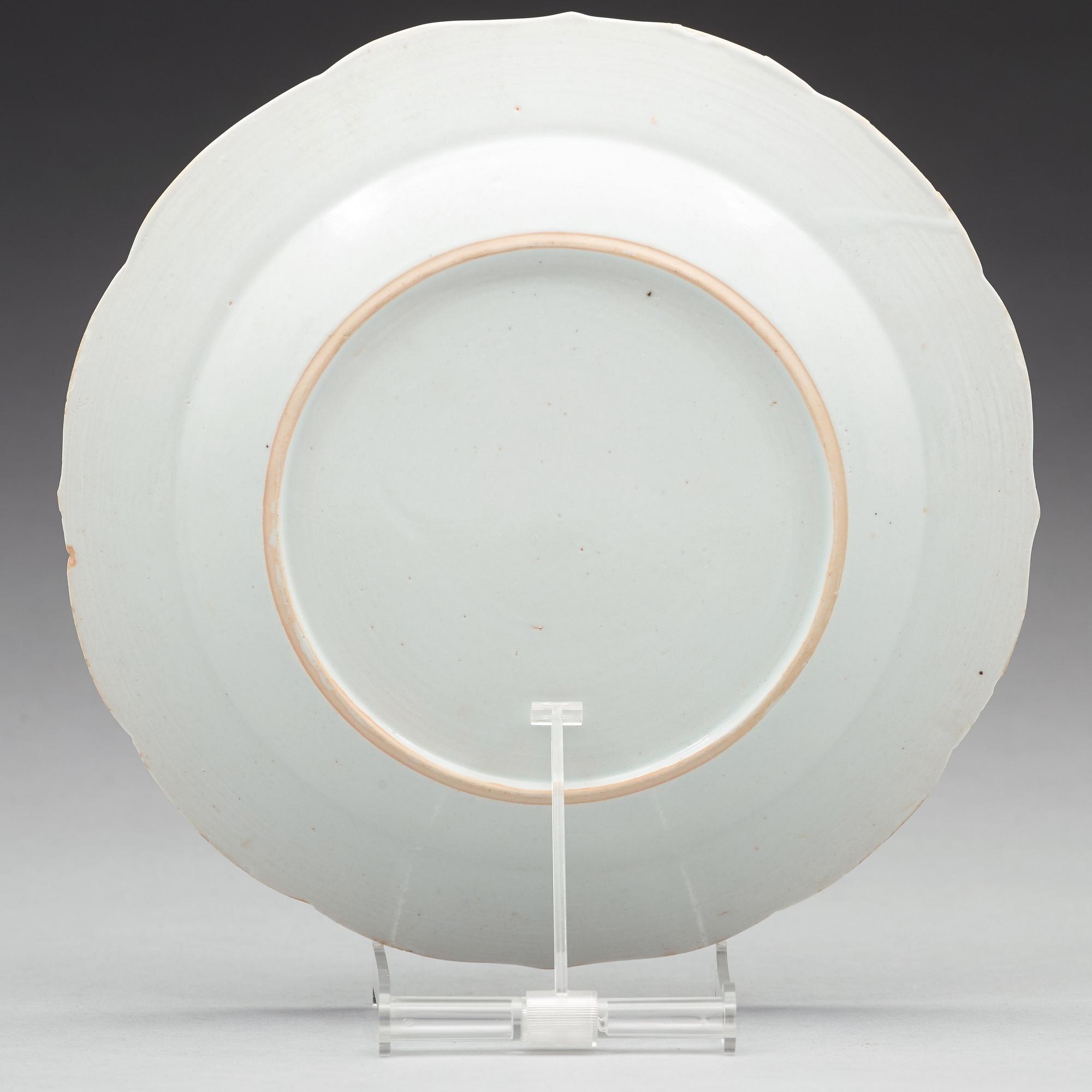 A set of 12 famille rose dinner plates, Qing dynasty, Qianlong (1736-95).