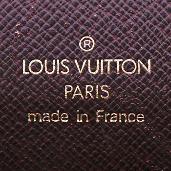 LOUIS VUITTON,  a brown taiga leather birefcase, "Angara".