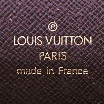 LOUIS VUITTON,  a brown taiga leather birefcase, "Angara".