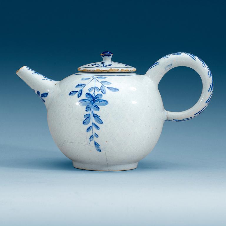 A Swedish Rörstrand faience teapot with cover, 18th Century.