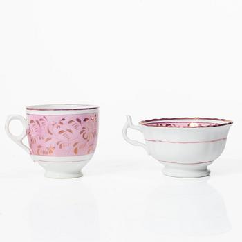 Twelve cups and saucers, England, 19th century.