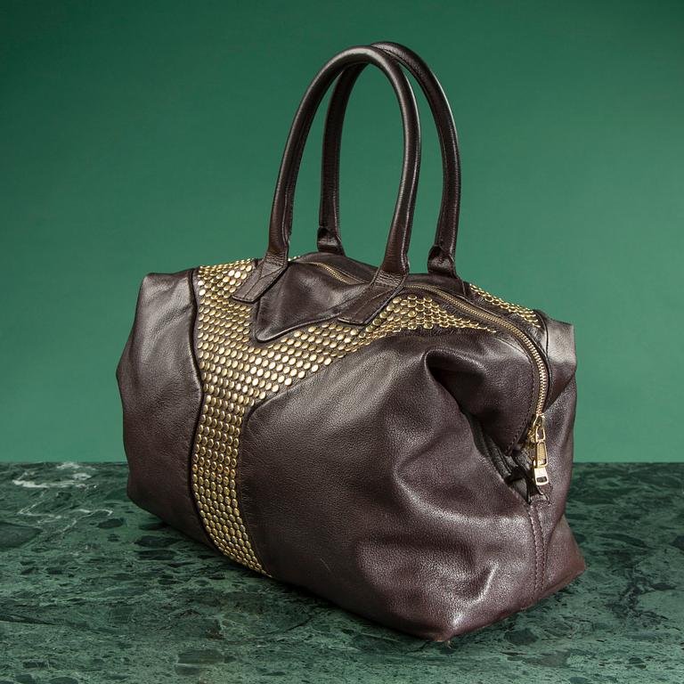 A bag by YVES SAINT LAURENT.