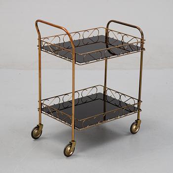 A brass and glass serving trolley, later part of the 20th Century.
