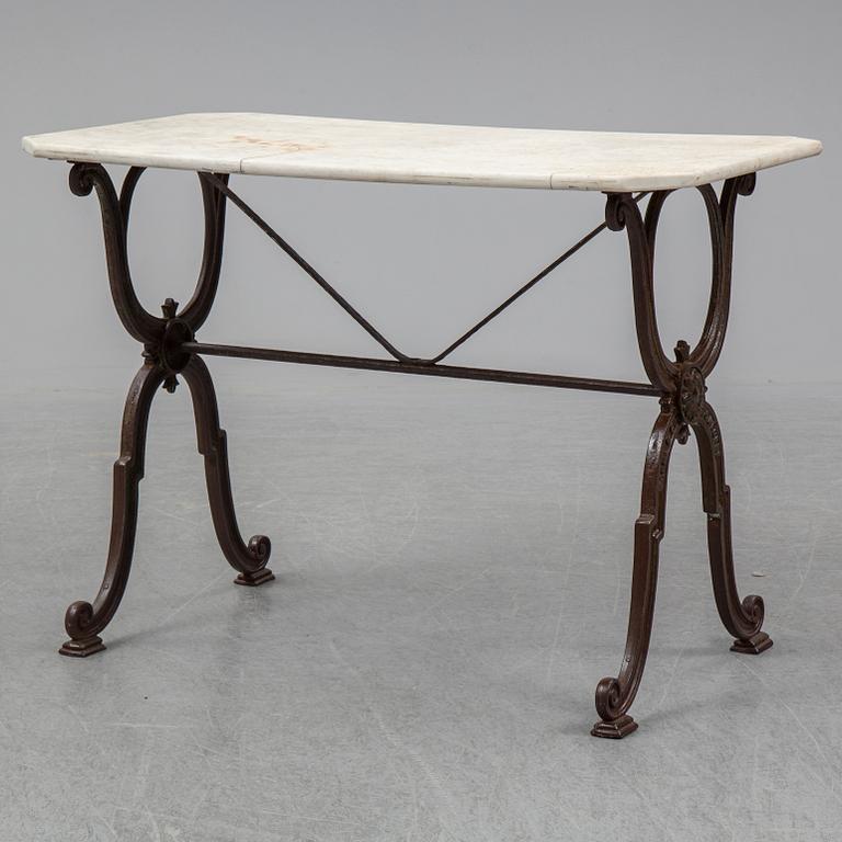 a cast iron and marble table from Corné & Cie Toulouse, around 1900.