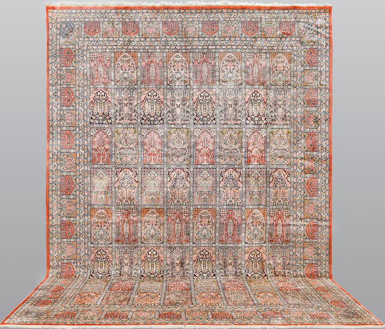 A Kashmir silk carpet, c. 434 x 307 cm.