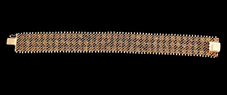 ARMBAND, 18 k guld. Vikt ca 35 g.