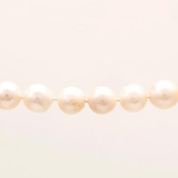 A necklace of cultured pearls, lock in 18K white and red gold set with a round brilliant cut diamond by Ole Lynggaard.