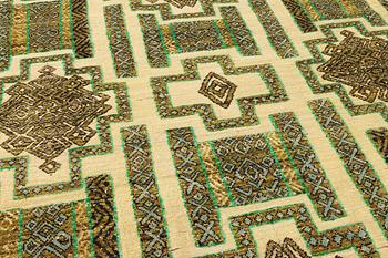 A Moroccan carpet, a. 305 x 196 cm.