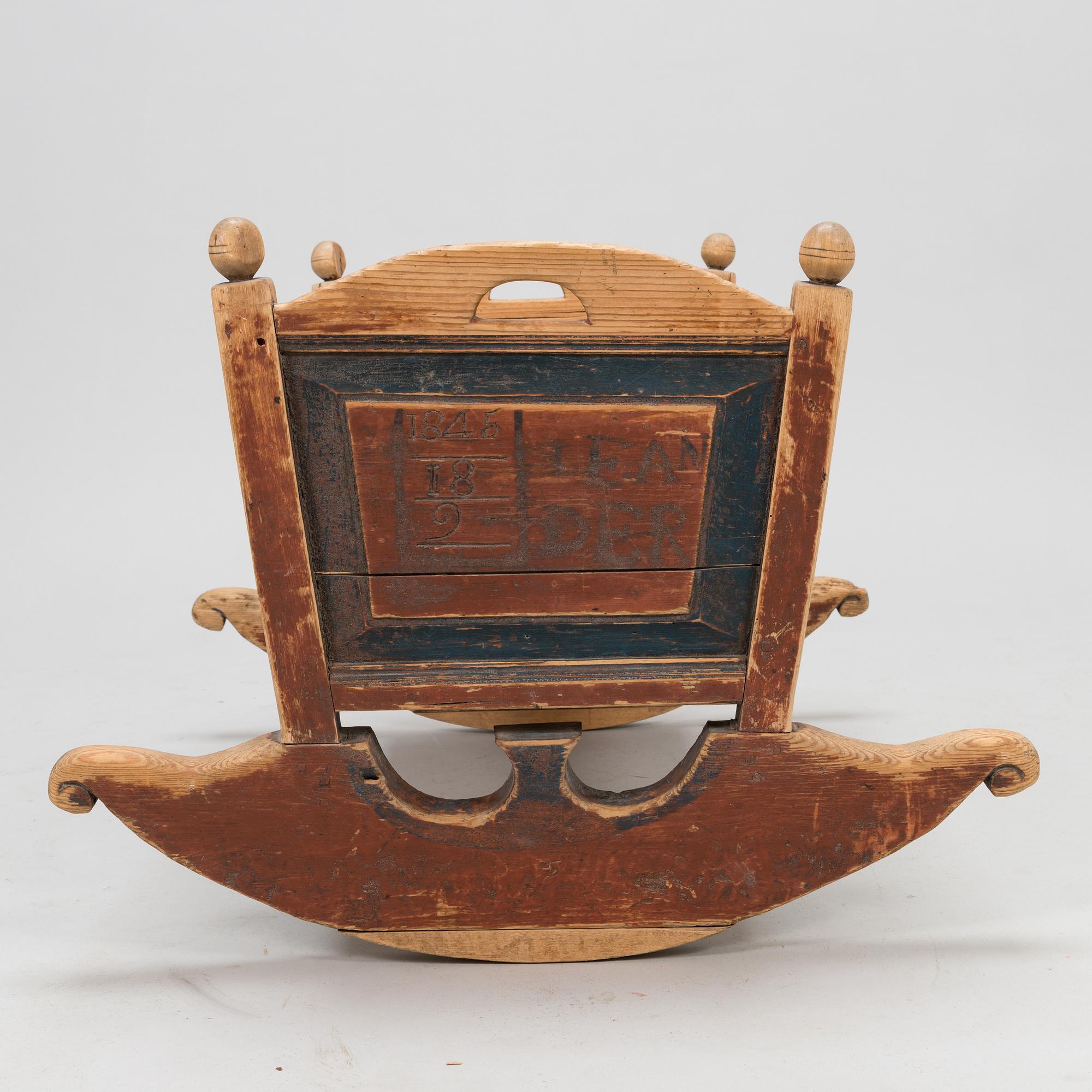 A cradle dated 18.9 1845.
