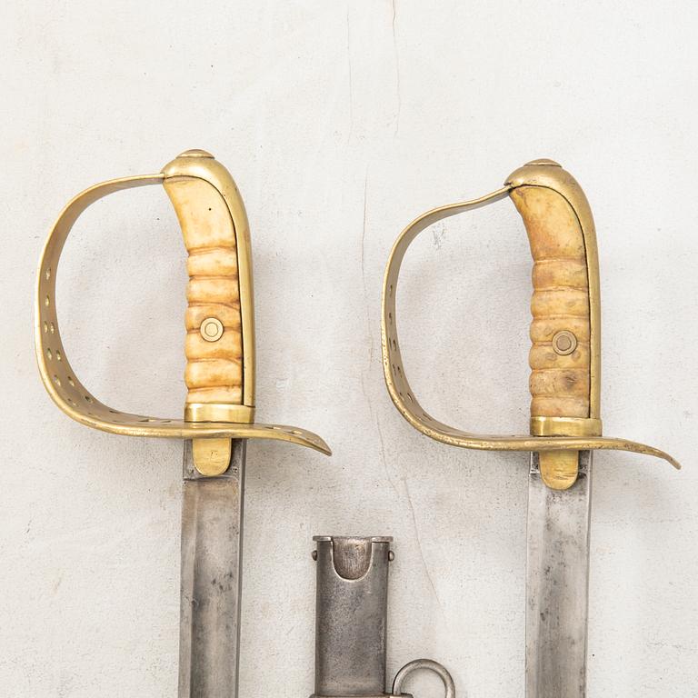 Two Swedish cavalry swords 1867 pattern, one with scabbard.
