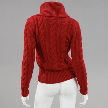 Two knitted sweaters by ralph lauren.