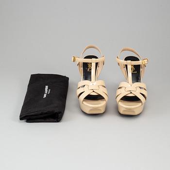 YVES SAINT LAURENT, a pair of open toe patent leather shoes, size 36½.
