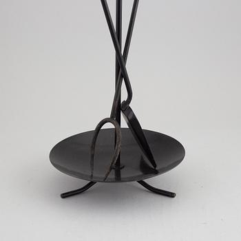 A fireplace stand of three parts by Gunnar Ander for Ystad Metall.