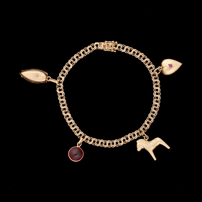ARMBAND, 18k guld med berlocker. Göteborg 1953. Total vikt ca 10 g.