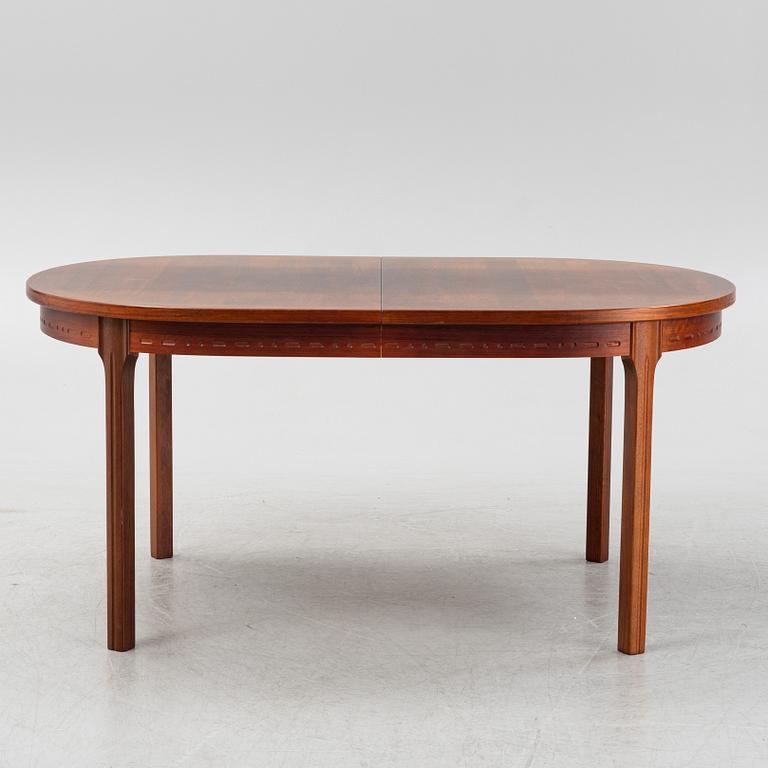 A rosewood-veneered dining table, Hugo Troeds, Björnum, Sweden, 1960's.