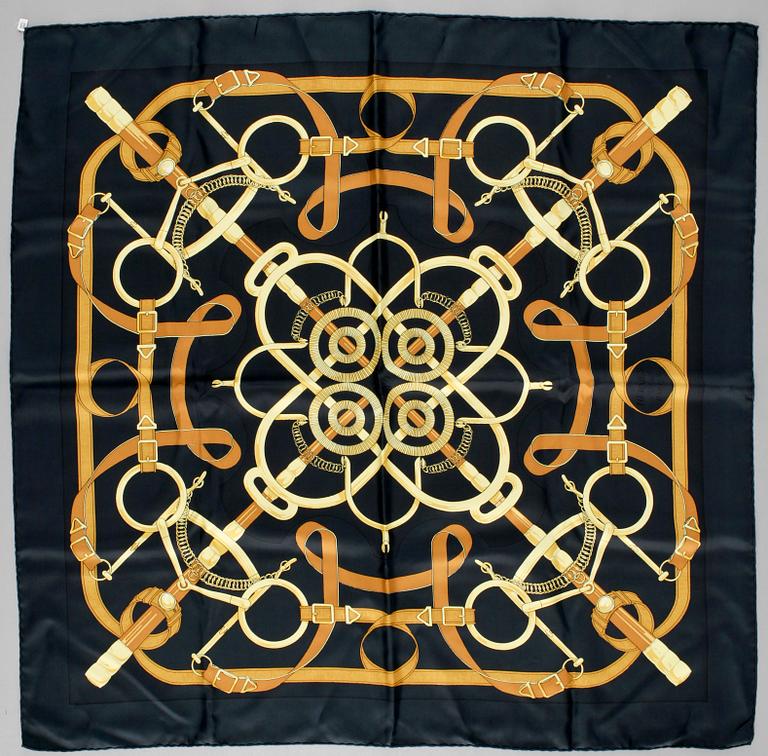 A silk scarf "Eperon d'Or" by Hermès.
