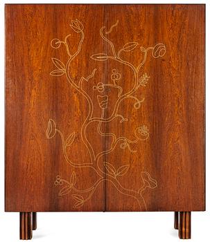 632. A palisander cabinet with brass inlays possibly designed by Oscar Nilsson, executed by Wickström, Stockholm 1940's.
