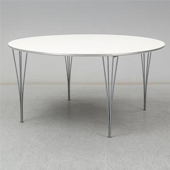 A 'Supercircle' table by Bruno Mathsson & Piet Hein for Fritz Hansen.