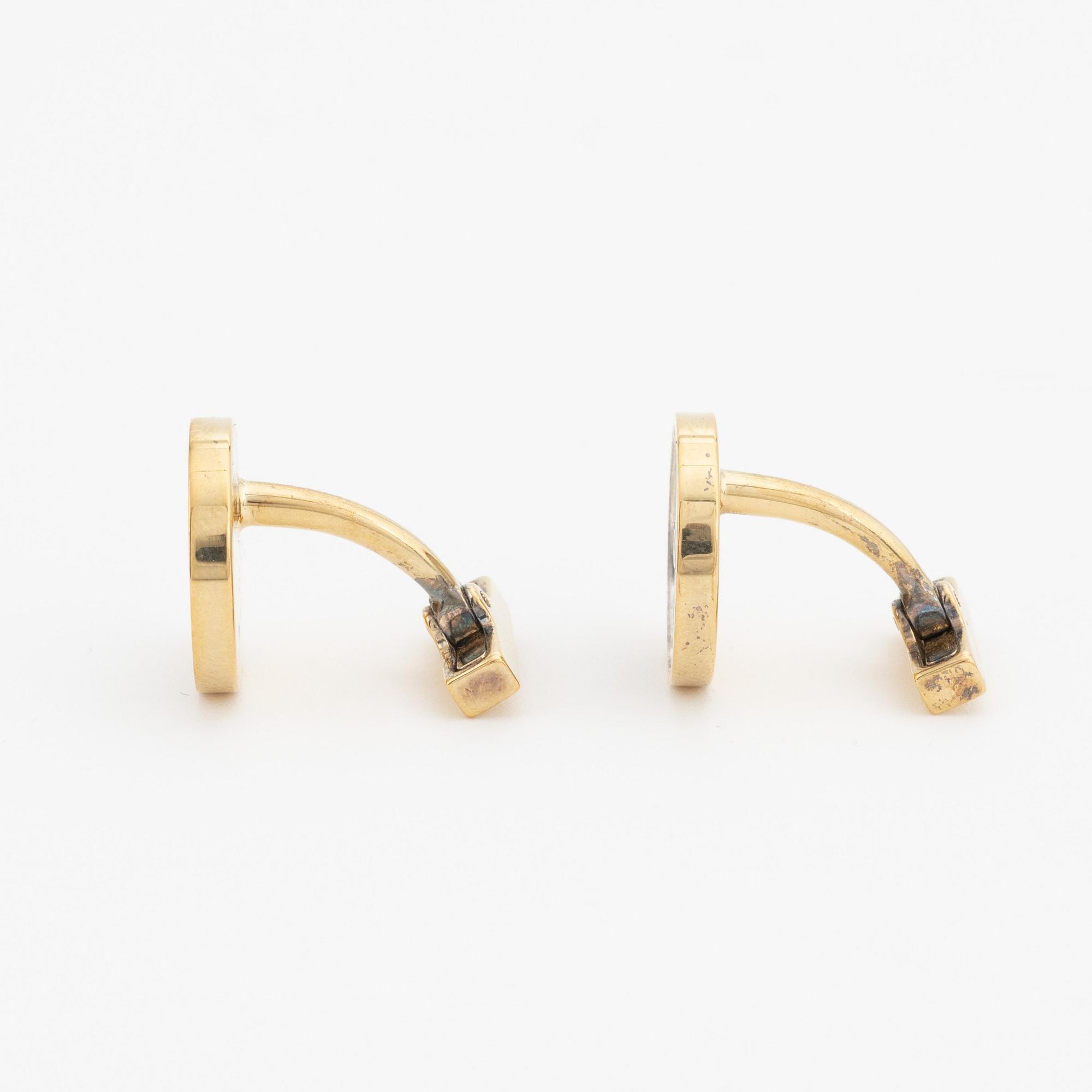 Louis Vuitton, a pair of cufflinks in a damier ebene case.