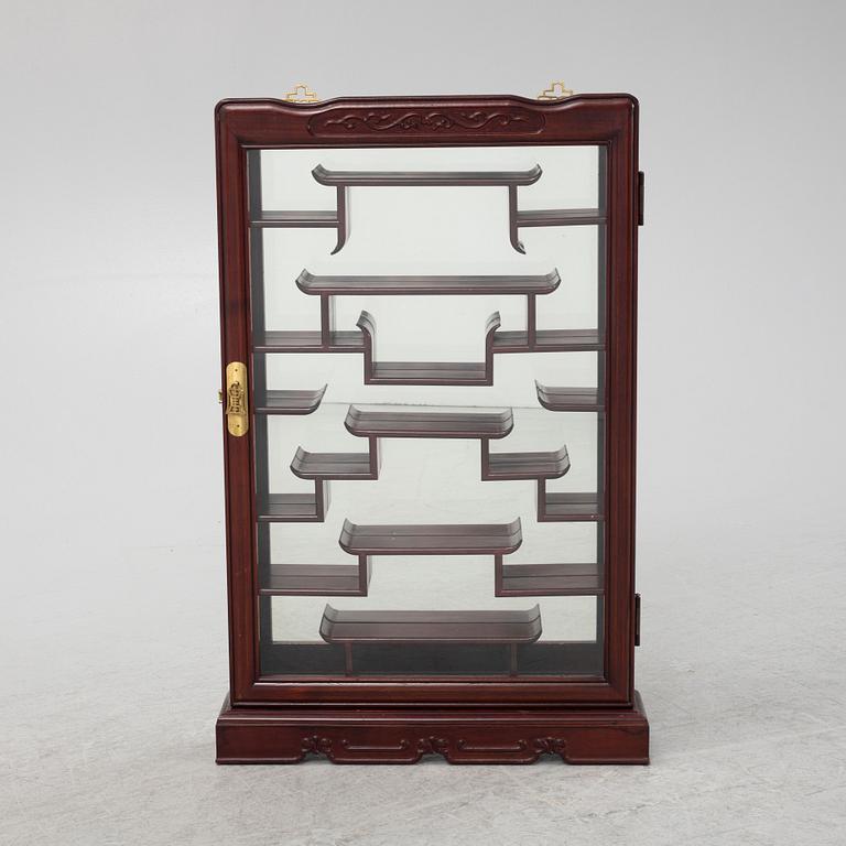 A wall hanged display cabinet, China, 20th century.