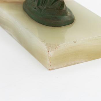 A pair of alabaster and  patinated metal Art Deco bookends from the first half of the 20th Century.