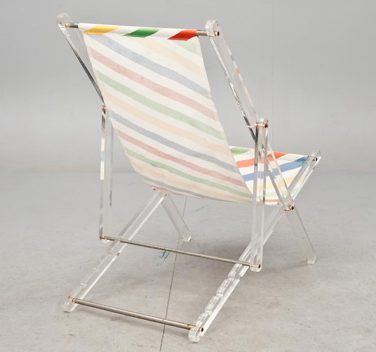 SOLSTOL, plexiglas, 1980-tal och FÄLLSTOL, "Plia", Giancarlo Piretti för Castelli, 1960-talets slut.