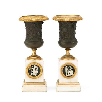 1298. A pair of Louis XVI late 18th century urns.