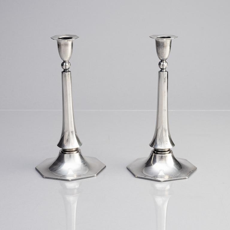 A pair of Swedish silver candlesticks, bearing the mark of GAB Stockholm, 1934.