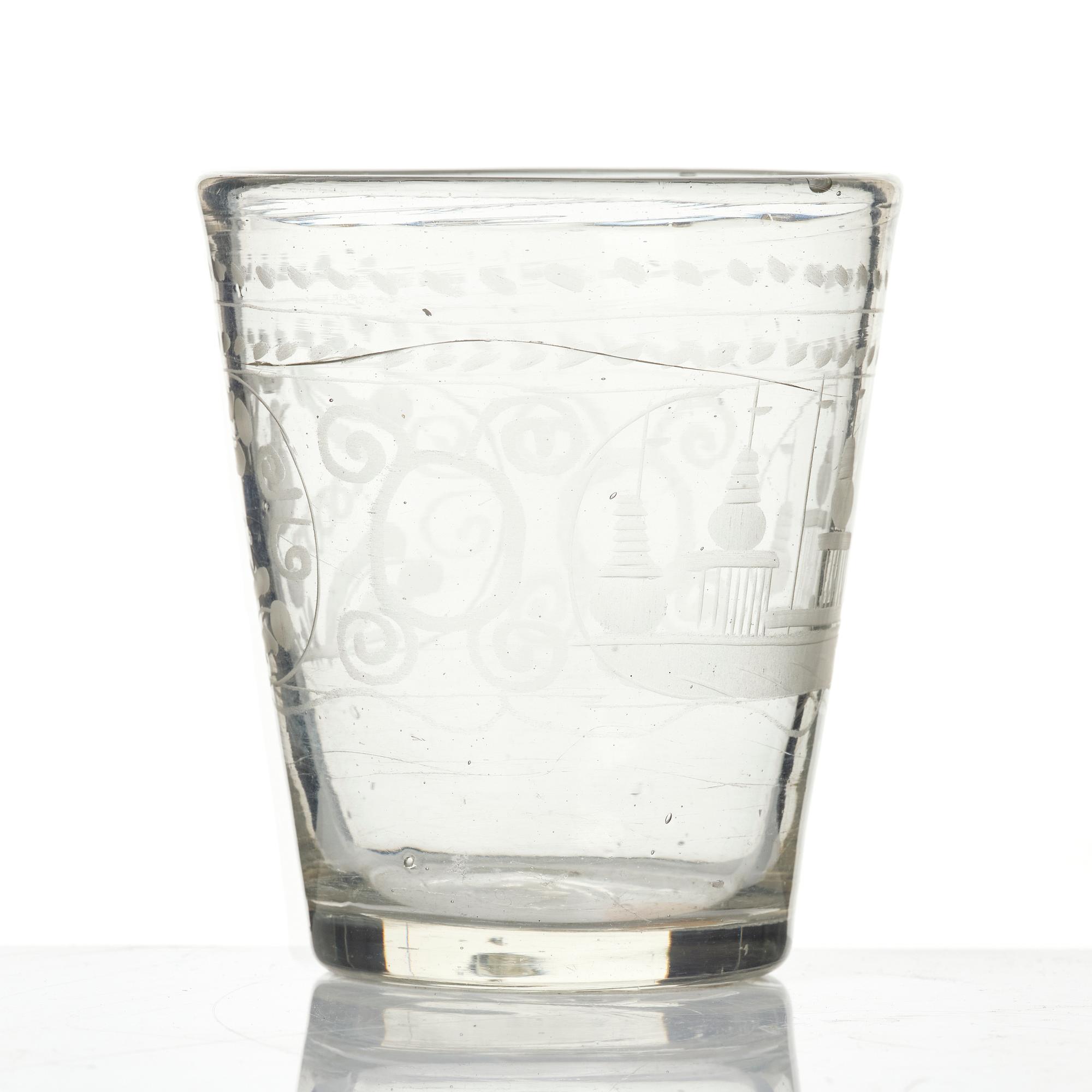 An engraved glass goblet, 18th century.