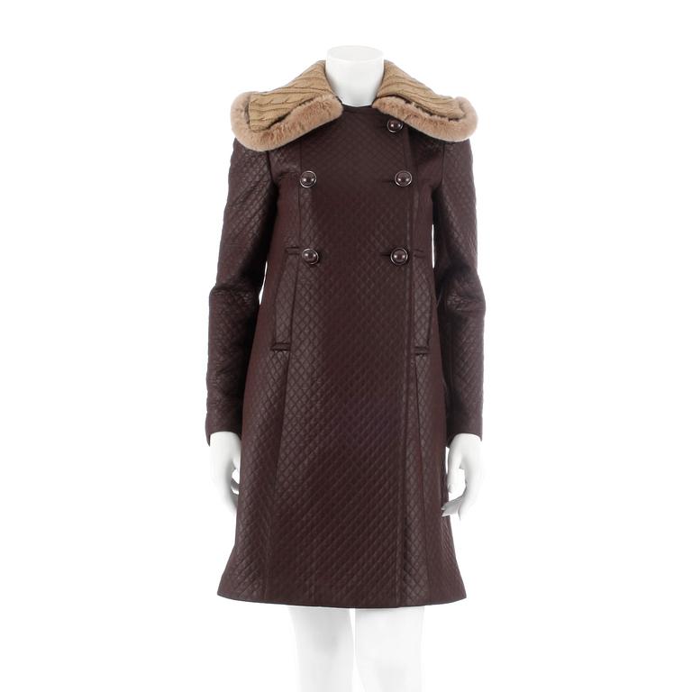 PRADA, a brown quilted overcoat, size 38.