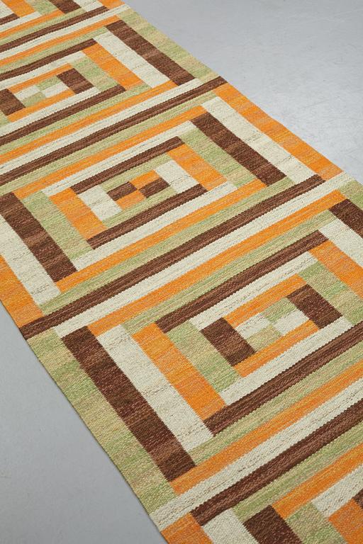 Barbro Nilsson, matto, a runner, "Ostia orange", flat weave, ca 306-307 x 99-100 cm, signed AB MMF BN.