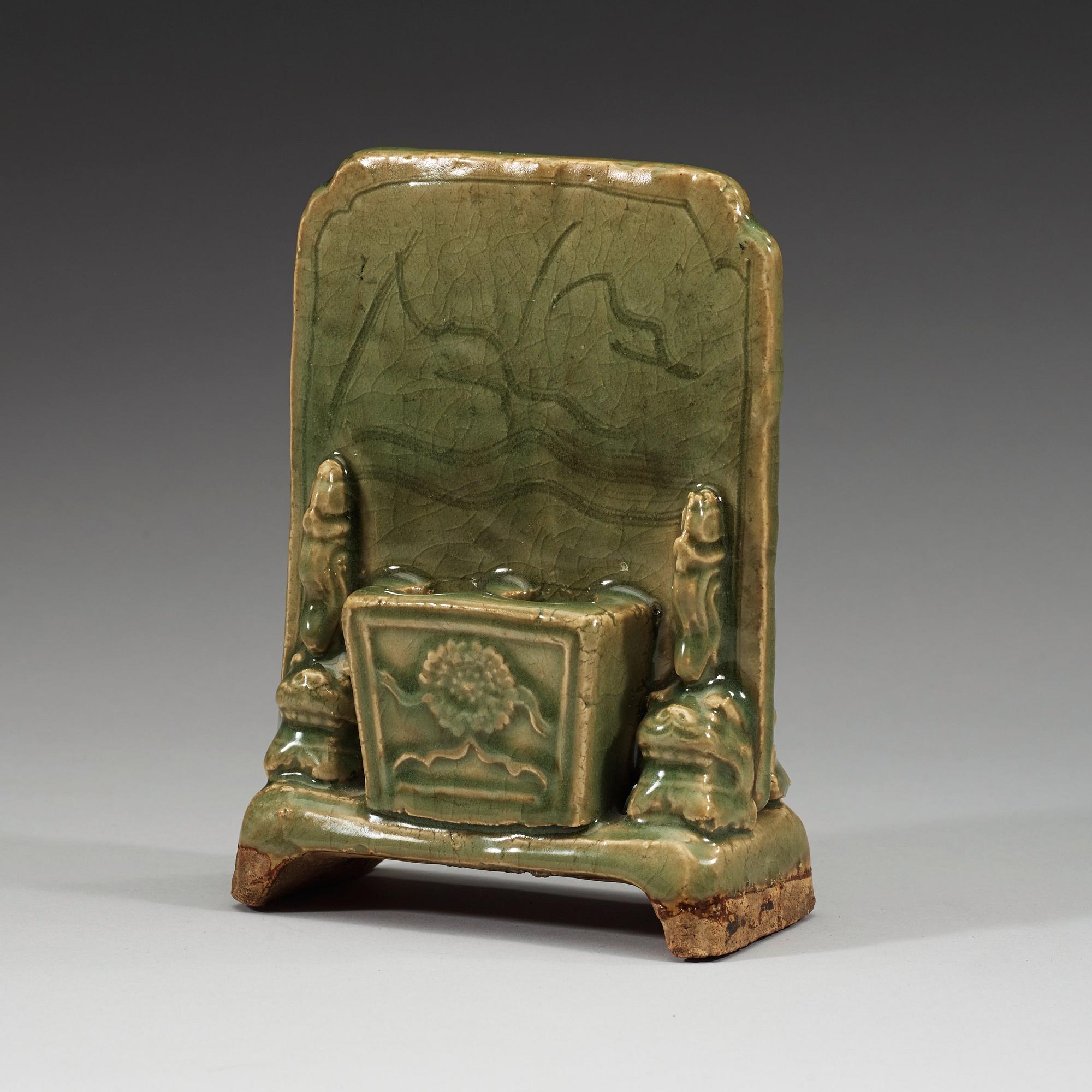A celadon table screen shaped brush stand, Ming dynasty (1368-1644).