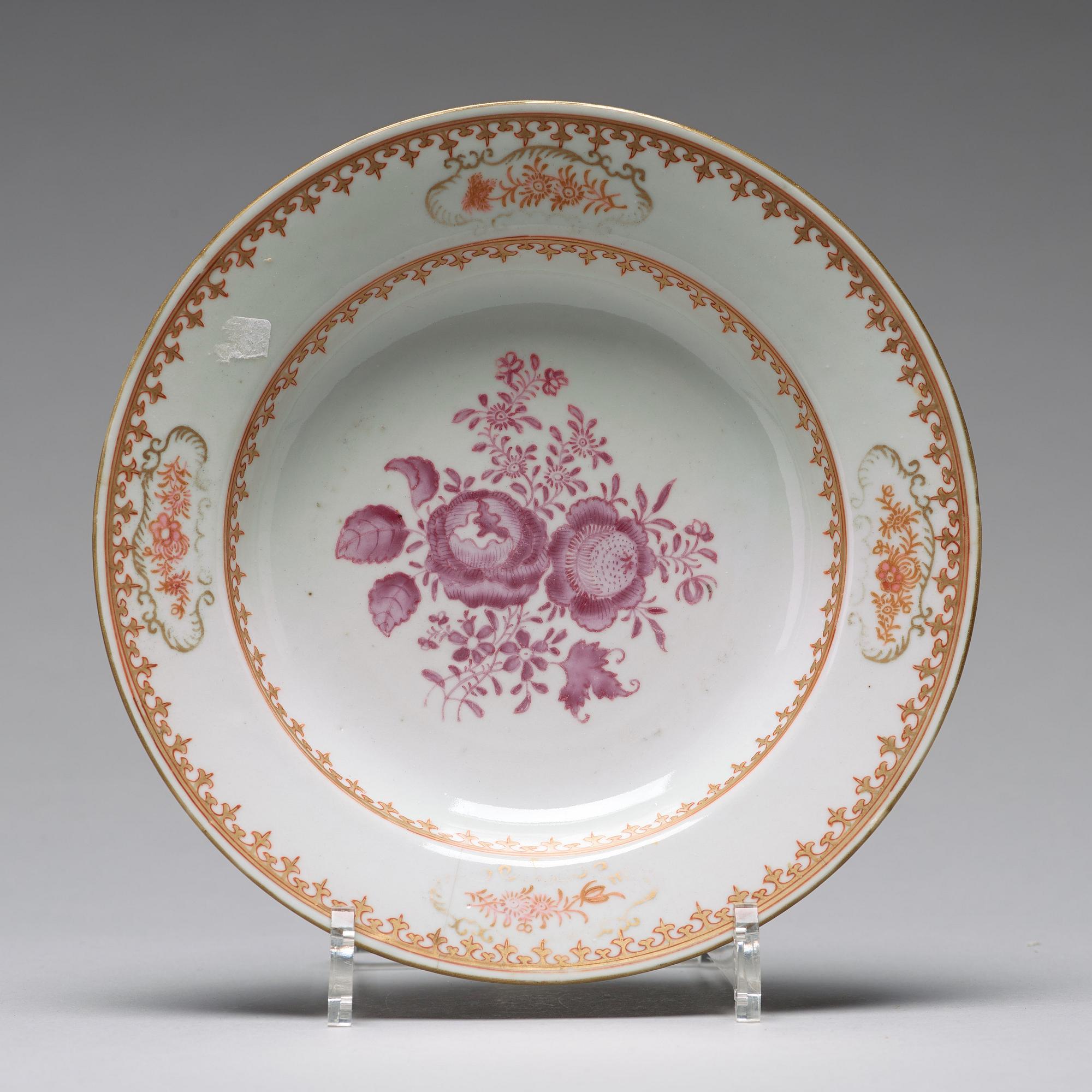 A set of 11 famille rose dinner plates, Qing dynasty, Qianlong (1736-95).