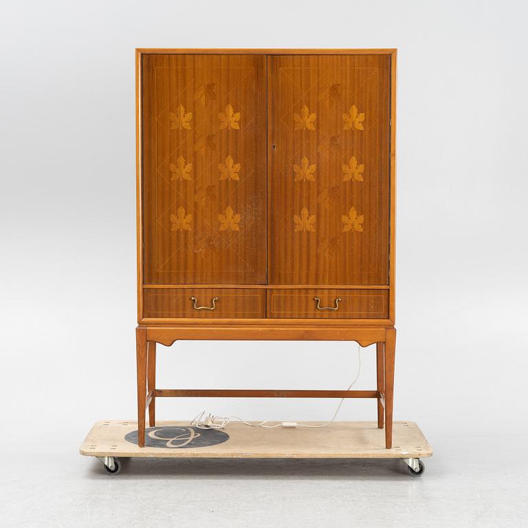 A Swedsih Modern mahogany veneered drinks cabinet, 1940s/50s.