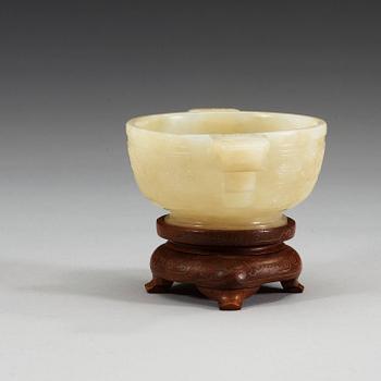 A carved nephrite cup, China.