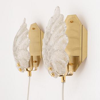 A pair of brass and glass wall lamps, Rejmyre Armaturfabrik, second half of the 20th century.