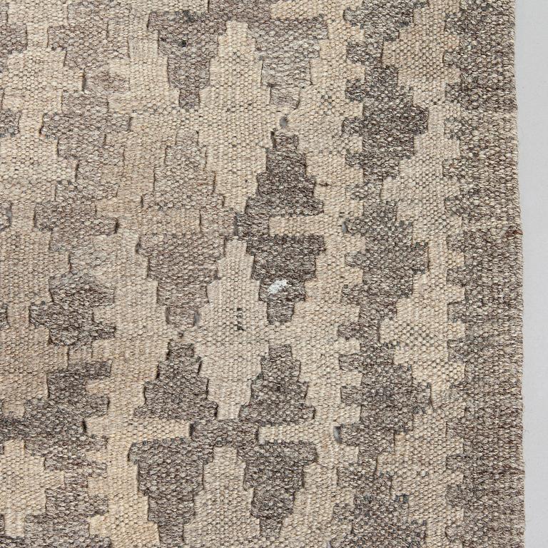 A Kilim carpet, ca. 262 x 176 cm.