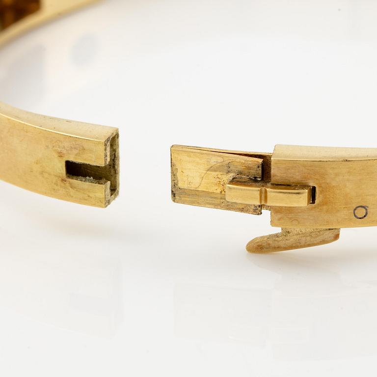 Wiwen Nilsson, a bracelet, 18K gold with round brilliant-cut diamonds, Lund 1962.