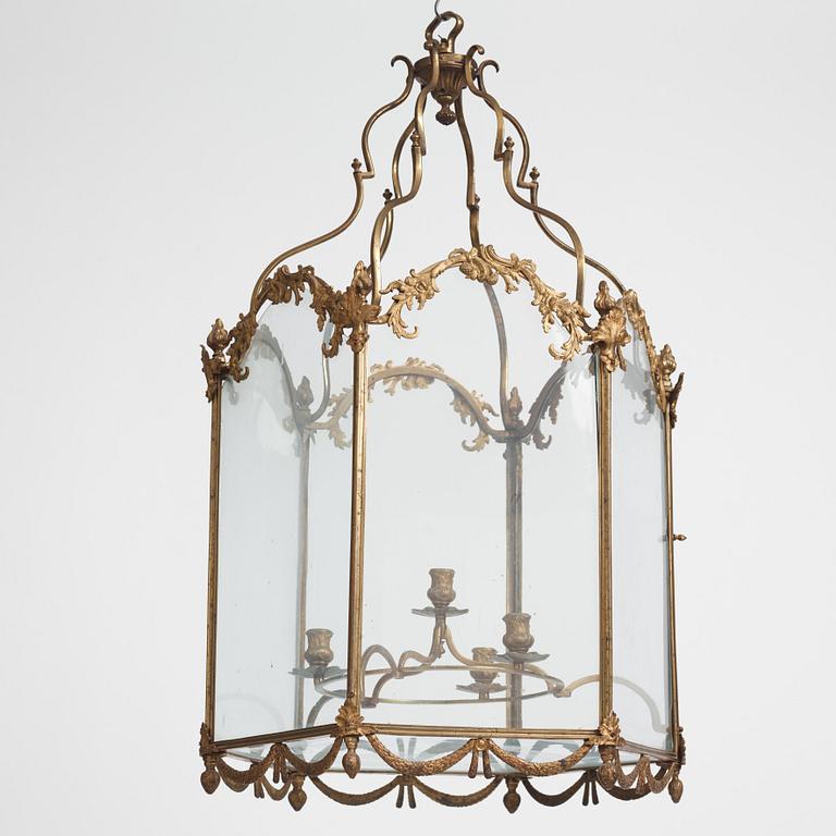 A Swedish rococo gilt-brass four-light lantern, possibly a masterpiece, Stockholm, later part of the 18th century.