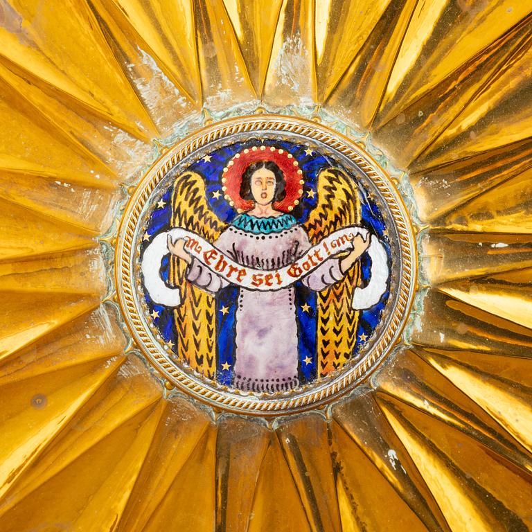 A large gilded brass dish, with enamel decoration, 19th Century.