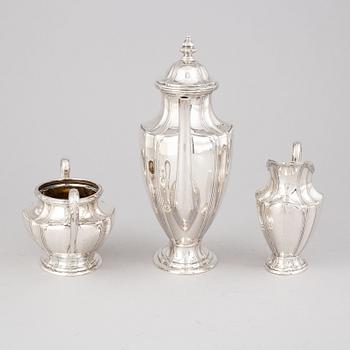 A three piece rococo style silver coffee service by John Victorin, Varberg, 1920.