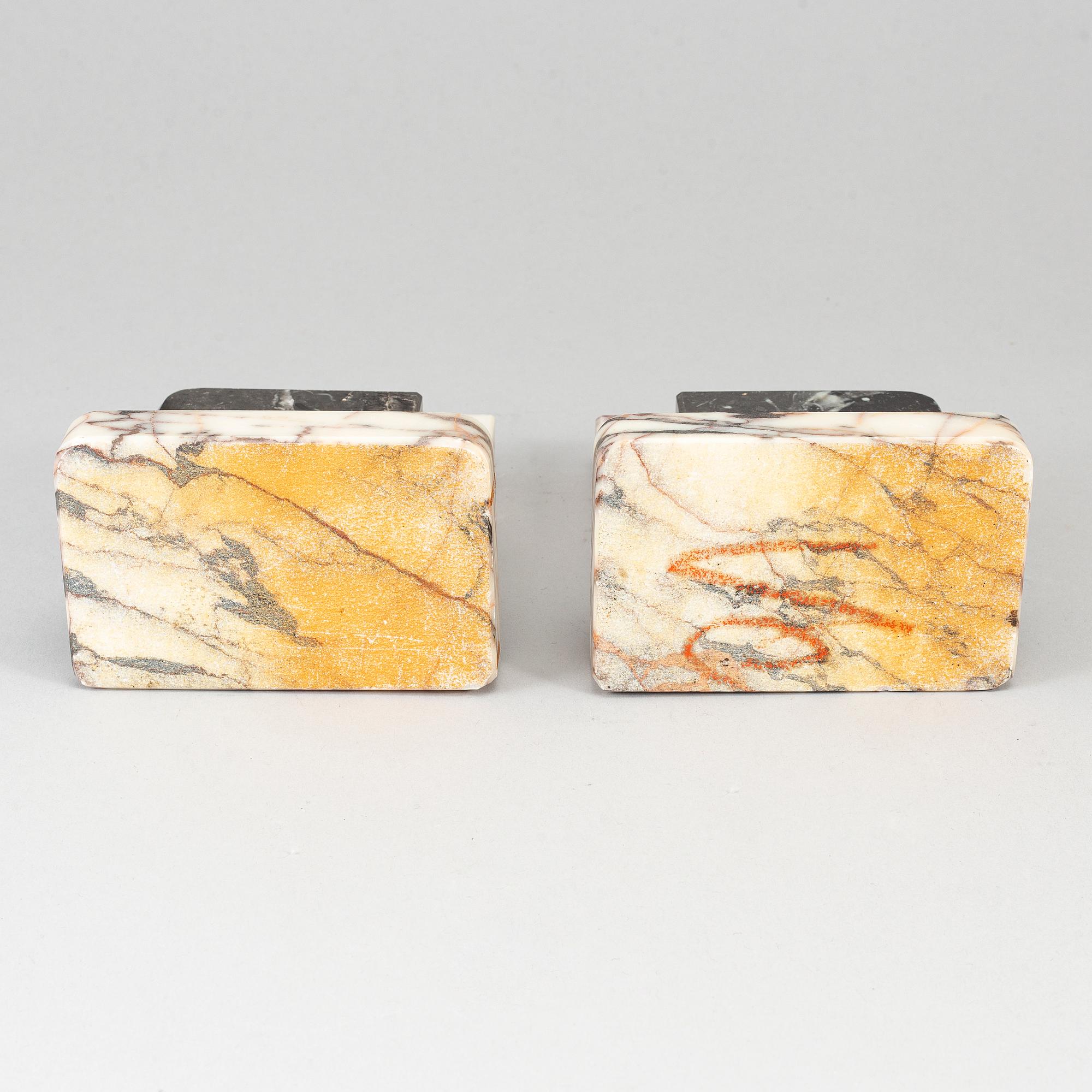 A pair of art déco marble book ends, 1930s.