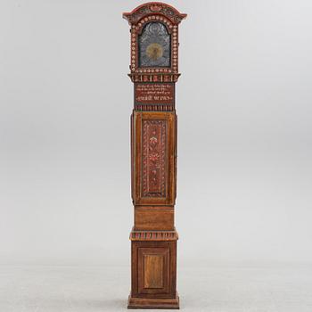 a painted grandfather-clock dated 1823.