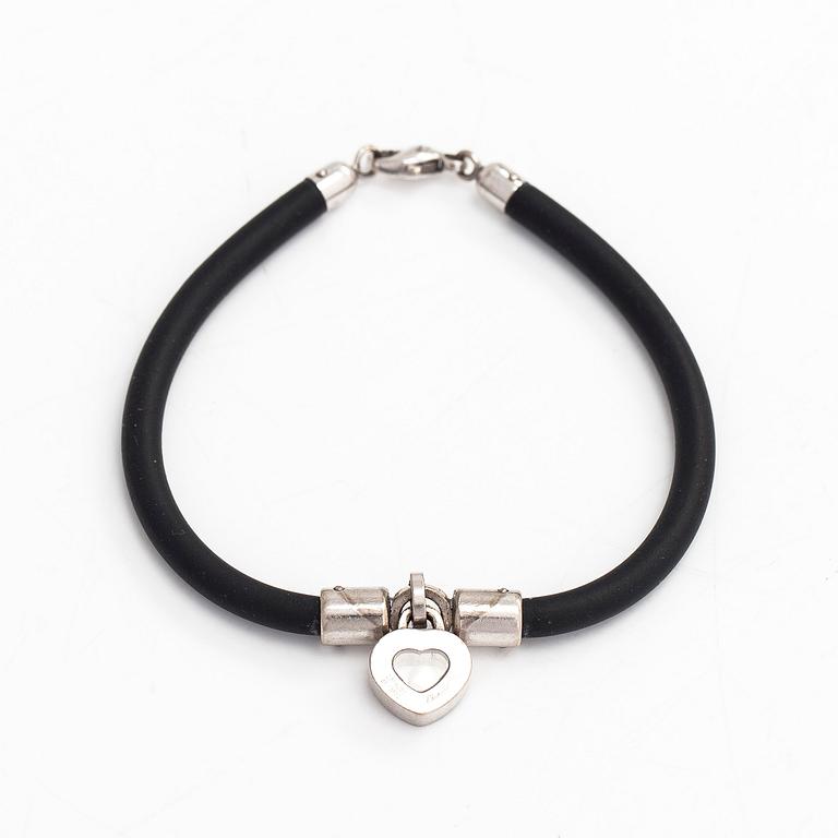 Chopard, armband, "Happy Diamonds", 18K vitguld, gummi och en diamant 0.05 ct.