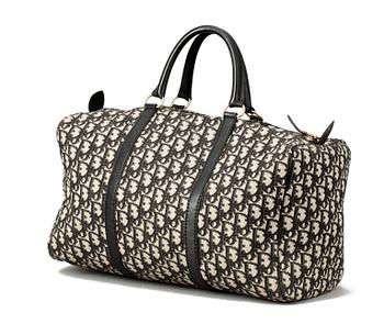 A black monogram canvas speedy bag by Christian Dior.