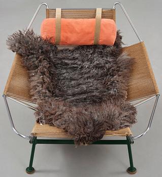 Hans J. Wegner, a 'Flag Halyard' easy chair, Getama, Denmark.