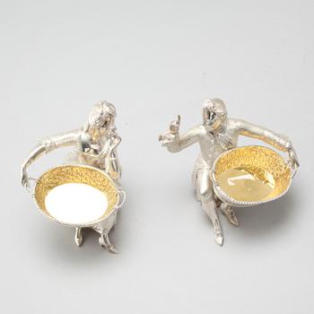 A pair of silver figurines bought at Garrard, London, 21th century.