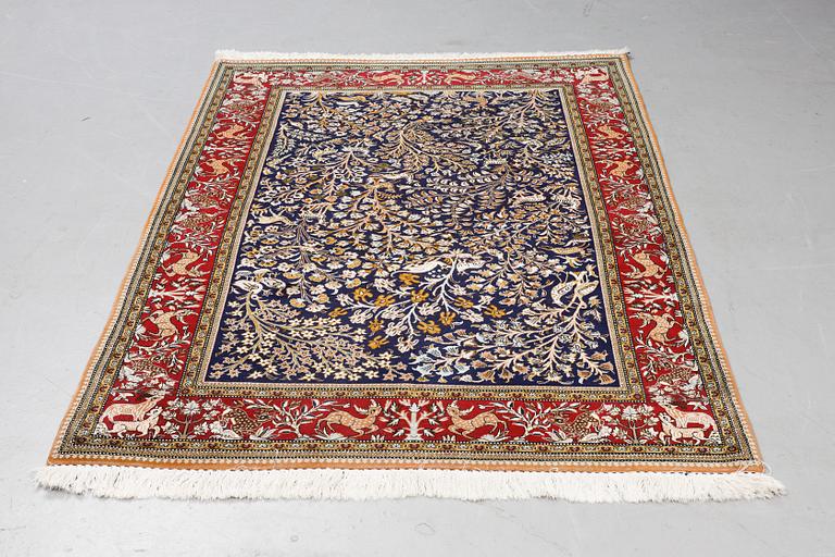 A rug, Old Qum, part silk, figural, ca 204 x 140 cm.