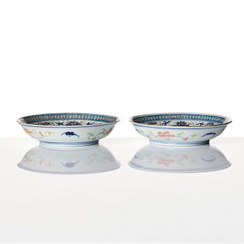 A pair of lotus dishes, Qing dynasty, with Guangxu mark and of the period (1875-1908).