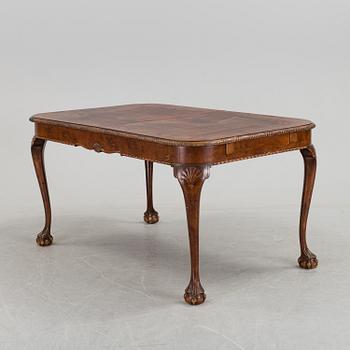 A 1920's 7 piece Chippendale-style dining group.
